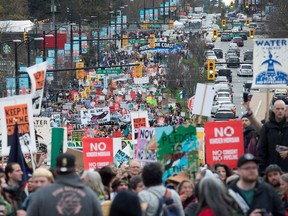 Thousands of people march during a protest against the Kinder Morgan Trans Mountain pipeline expansion, in Vancouver on Nov. 19, 2016. The proposed $5-billion expansion would nearly triple the capacity of the pipeline that carries crude oil from near Edmonton to the Vancouver area to be loaded on tankers and shipped overseas. A federal government decision on whether to approve the proposal is expected by Dec. 19.