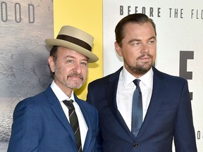 Director Fisher Stevens (left) and executive producer Leonardo DiCaprio attend the screening of National Geographic Channel's "Before The Flood" at Bing Theater At LACMA on Oct. 24, 2016, in Los Angeles.