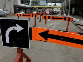 Construction signs in downtown Edmonton on November 15, 2016. Last year, the city issued 9000 permits for construction barriers and detours. This year, we may beat that record.