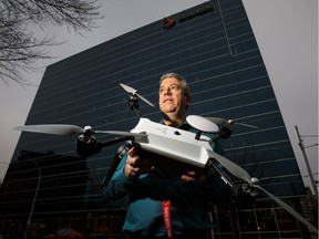 Stantec geomatics manager Kevin MacLeod shows off one of the new Skycatch drones the company has introduced, near Stantec Centre in Edmonton, Alta., on Tuesday, Nov. 15, 2016.