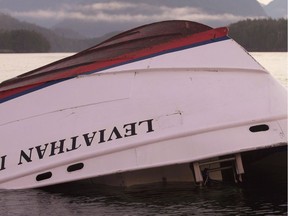 The bow of the Leviathan II, a whale-watching boat owned by Jamie's Whaling Station carrying 24 passengers and three crew members that capsized on Sunday, October 25, 2015 is seen near Vargas Island Tuesday, October 27, 2015 as it waits to be towed into Tofino, B.C., for inspection.