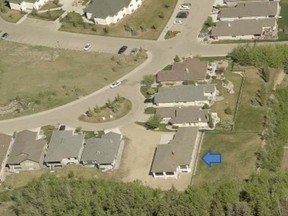 This house was supposed to be built 4.5 metres from the edge of the park but crews from Celebration homes started construction before the city issued the permit and didn't realize their error. The empty lot in this photo now has a completed home on it as well.