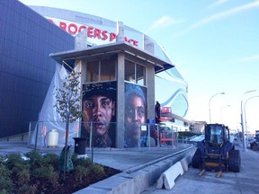 Photo of Pillars of the Community mural on the ETS vent before the portrait on the left was replaced.