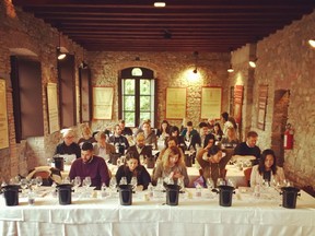 Tasting of red wines from the Friuli region at the Collisioni Progetto Vino conference. Bhatia is in the second row.