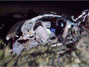 Wreckage of a car that collided head-on with a logging truck outside Whitecourt on Nov. 22, 2016.