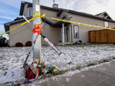 A memorial was set up outside the house on Haney Court in Spruce Grove where Radek and Ryder MacDougall, 11 and 13, were found dead with their father, Corry, on Dec. 19 in an apparent murder-suicide.
