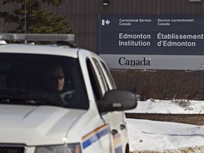 An RCMP car leaves the Edmonton Institution in 2011.