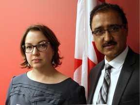 Andrea Burkhart, executive director of the Action Coalition on Human Trafficking (ACT) Alberta Association, and Amarjeet Sohi, federal minister of infrastructure and communities, at the release of the first-of-its-kind report on Friday, Dec. 2, 2016, highlighting issues that open up foreign workers to labour exploitation in Edmonton.