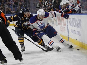 Buffalo Sabres Jake McCabe (29) defends against Edmonton Oilers center Leon Draisaitl (29) during the second period of an NHL hockey game, Tuesday, Dec. 6, 2016, in Buffalo, N.Y.