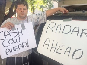 Edmonton resident Jack Shultz, 42, created signs in May 2016 to warn drivers about hidden photo radar vans and got a $543 fine for stunting.