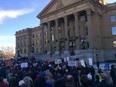 A crowd gathers outside the Alberta legislature on the weekend to protest the carbon tax.
