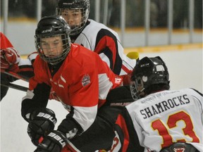 EDMONTON, AB. DECEMBER 30, 2012 - Devon Ho of the Knights of Columbus Shamrocks chases Jayden Buxton of the Wainwright Polar Kings in the Edmonton Invitational Bantam Tournament at the Callingwood twin arenas. STANDALONE. SHAUGHN BUTTS/EDMONTON JOURNAL