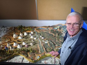 EDMONTON, ALTA: AUGUST 18, 2015 -- Wallis Kendal, Founder of Moving the Mountain Program, poses for a photo with a diorama built by his students. Moving the Mountain is a radical new program for extremely high risk First Nations girls, hosted at the University of Alberta in Edmonton on August 18, 2015.
