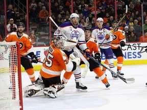PHILADELPHIA, PA - DECEMBER 08: The Philadelphia Flyers and Edmonton Oilers follow the puck in the third period at Wells Fargo Center on December 8, 2016 in Philadelphia, Pennsylvania.