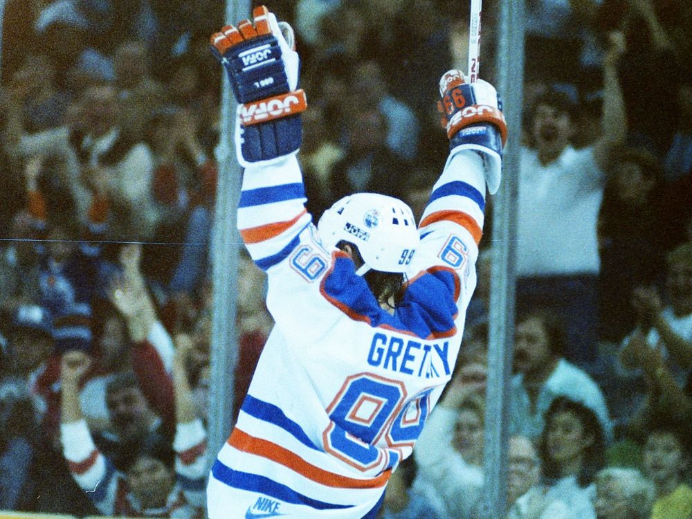 Edmonton Oilers centre Wayne Gretzky celebrates one of the five goals he scored on the Minnesota North Stars during NHL action at Northlands Coliseum on Dec. 6, 1987.