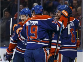 Edmonton's Oscar Klefbom (left) celebrates his goal with teammates during the second period of a NHL game between the Edmonton Oilers and the Winnipeg Jets at Rogers Place in Edmonton, Alberta on Sunday, December 11, 2016.
