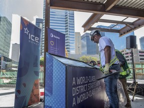 Dan Ruzza smoothes the concrete where dignitaries later placed their hands for a permanent installation. The Ice District and Stantec celebrated the start of the Stantec Tower's superstructure last August. Once completed, the tower will be the tallest building in Edmonton and among the tallest in Western Canada.