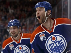 Edmonton's Zack Kassian (right) celebrates an overturned goal during the second period of a NHL game between the Edmonton Oilers and the Winnipeg Jets at Rogers Place in Edmonton, Alberta on Sunday, December 11, 2016. Ian Kucerak / Postmedia