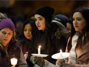 Friends and family members of Rachael Longridge, a nurse killed on Dec. 23, held a candlelight vigil outside of the Edmonton Clinic Health Academy at the University of Alberta in Edmonton, Alberta on Wednesday, December 28, 2016.