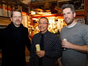 Geoffrey Lilge, left, Mike Lam and Richard Cor pose together during the Timbre open house in Edmonton on Friday, Dec. 16, 2016.