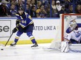 St. Louis Blues' Nail Yakupov, of Russia, looks to pass as Edmonton Oilers goalie Cam Talbot, right, keeps watch during the second period of an NHL hockey game, Monday, Dec. 19, 2016, in St. Louis.
