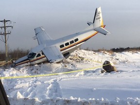 A crashed Cessna Caravan south of Fort McMurray, Alta. on Tuesday, December 27, 2016.
