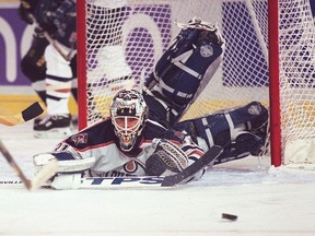 Edmonton Oilers goalie Curtis Joseph in action against the Dallas Stars on Nov. 18, 1996.