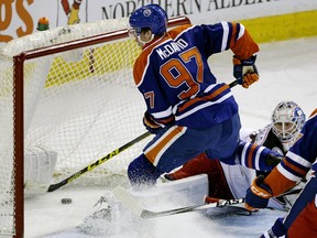 Edmonton Oiler Connor McDavid scores a spectacular goal against Columbus Blue Jackets goalie Joonas Korpisalo during second period NHL game action in Edmonton on Feb. 2, 2016. This was McDavid's sixth career goal in his rookie year after missing 37 games when he broke his collarbone on November 3, 2015 in a game against the Philadelphia Flyers.