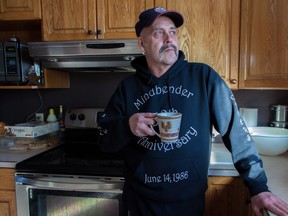 Rodney Chayko drinks a cup of coffee at his home in Revelstoke, B.C. on Thursday, December 15, 2016. It's been 30 years since Chayko was flung from a flying roller-coaster at West Edmonton Mall, and it bothers him still that there is no memorial at the site to honour the three people who died that day.