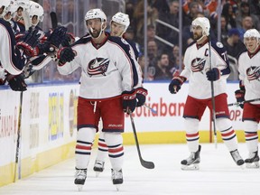 Columbus Blue Jackets' Sam Gagner (89) celebrates a goal with teammates agains the Edmonton Oilers during second period NHL action in Edmonton, Alta., on Tuesday December 13, 2016.