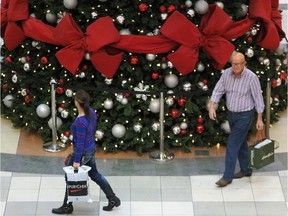 Last minute Christmas shoppers at City Centre Mall on December 23, 2013.