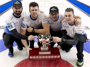Team Carruthers skip Reid Carruthers, left to right, third Braeden Moskowy, second Derek Samagalski and lead Colin Hodgson pose with the trophy after defeating Team Gushue at the Canada Cup of Curling in Brandon, Man., on Sunday, Dec. 4, 2016.