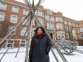 Kim TallBear, the first Canada Research Chair in Indigenous Peoples, Technoscience and Environment, poses for a photo outside Pembina Hall at the University of Alberta in Edmonton on Thursday, Dec. 15, 2016.