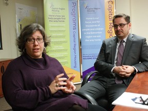 Capital Region Housing policy director Esther de Vos, left, and CEO Greg Dewling discuss on Tues. Dec. 6, 2016 a new education program for tenants that the agency is launching in Edmonton in the new year.