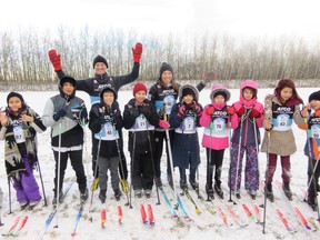 Don Patterson and Beckie Scott, Canada's gold medal winning cross-country skiing Olympian, gave students at the Enoch Band's Kitaskinaw School their first cross-country ski lesson just days before Christmas.