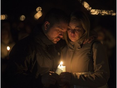 Whitecourt residents take part in a candlelight vigil for Radek MacDougall and Ryder MacDougall, on Tuesday Dec. 20, 2016. The two boys were were found dead in their Spruce Grove home on Monday Dec. 19, 2016.