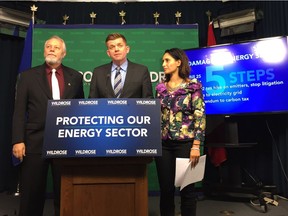 Wildrose MLA Don MacIntyre, party leader Brian Jean, and MLA Leela Aheer introduce the party's five-point plan to dismantle much of the government's energy agenda on Dec. 1, 2016.