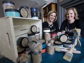 Sisters-in-law Desiree and Andrea Vienneau pose for a photo with their line of paint in Edmonton Tuesday Jan. 24, 2017. Reloved Vintage Paint products will be included in this year's gift bags for the Grammy Awards.