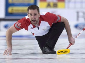 Team Newfoundland and Labrador skip Brad Gushue reacts as his shot enters the house during the gold medal game against Team Alberta at the Brier curling championship Sunday March 13, 2016 in Ottawa. Gushue is brimming with cautious optimism as he weighs in on when his injured left hip might be ready for him to return to the ice.