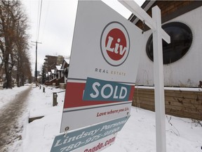 A sold sign is seen next to duplexes in Oliver. The central neighbourhood saw a 6.7 per cent increase in city-assessed property values this year.