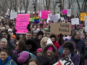 People gather for the sister march in Edmonton on Jan. 21, 2017 that coincided with the Women's March on Washington following Donald Trump's inauguration.