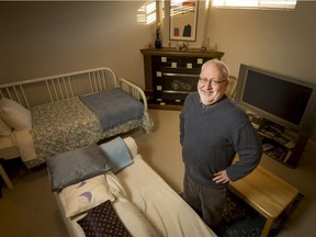 Airbnb host Keith Robinson poses for a photo at his home in Calgary, Alta., on Tuesday, Jan. 3, 2017. Robinson has hosted 1,000 people through Airbnb and is hoping to be able to provide input for the Alberta Hotel and Lodging Association's push to have provincial and municipal governments impose regulations on Airbnb hosts in Alberta.