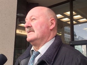 Staff Sgt. Bill Clark speaks about the sentence given to Nyuk Len Hwang on Jan. 6, 2017, outside of the Edmonton Law Courts.