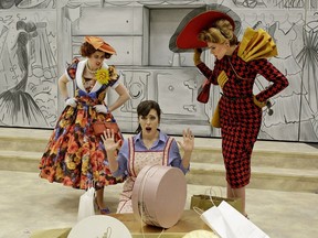 Caitlin Wood (left), Krisztina Szabo and Sylvia Szadovszki in a scene from Edmonton Opera's production of Cinderella.