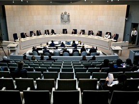 Councillors sit during city council's operating budget discussions at City Hall in Edmonton, Alta., on Monday, Nov. 25, 2013. File photo.