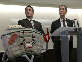 Dan Manning (left, Chair of the Board, Royal Alexandra Hospital Foundation) and Andrew Otway (right, CEO, Royal Alexandra Hospital Foundation) launched a public awareness campaign with mascot "Alex" at the hospital in Edmonton on January 24, 2017.