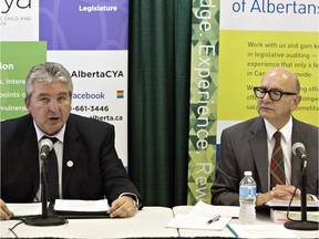 Child and youth advocate Del Graff and Alberta auditor general Merwan Saher speak to media at a joint press conference last July. Saher has a bold new idea about how to make the child advocate's work more relevant.