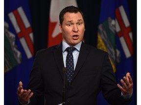 Economic Development and Trade Minister Deron Bilous speaks at the Alberta Legislature in Edmonton about U.S. President Donald Trump's decision to pull out of the Trans Pacific Partnership, on Monday, Jan. 23, 2017.