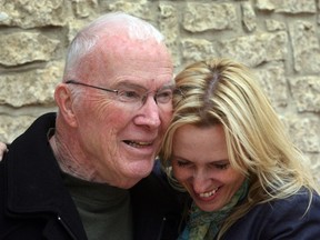 Edmonton city councillor Kim Krushell, right, hugs her mentor, former councillor Larry Langley, at City Hall in Edmonton, on June 11, 2013.  Langley died on Jan. 10, 2017.