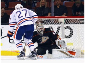 Milan Lucic #27 of the Edmonton Oilers misses a first period opportunity against John Gibson #36 of the Anaheim Ducks at the Honda Center on January 25, 2017 in Anaheim, California.